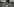 Ein Roboter vor einer Wand mit Bildern