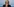 Jeanine Hennis hat den Kopf gesenkt und hält die Hände an den Mund
