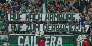 Werder-Fans mit Transparenten