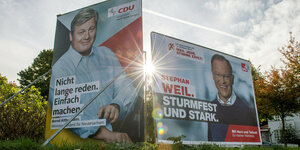 Wahlkampfplakate von CDU und SPD