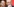 Ein Mann mit Brille guckt nachdenklich, im Hintergrund sieht man einen weiteren Mann