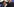 Sigmar Gabriel sitzt lächeln, Martin Schulz legt im die Hand auf den Kopf