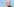 Ein Mann mit hoher Stirn, kurzen grau-blonden Haaren und einer dunklen Brille sitzt vor einer blauen Wand, auf der "Polizei" steht.