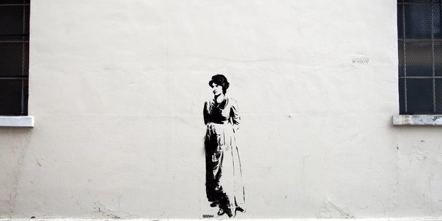 Stencil von Mary Wollstonecraft an einer weißen Wand