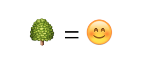 Ein Emoji von einem Baum und eines von einem Smiley, dazwischen steht ein Gleichheitszeichen