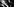 Ein schwarz-weiß Bild: Ein Mann fasst einem anderen Mann besorgt ans Auge