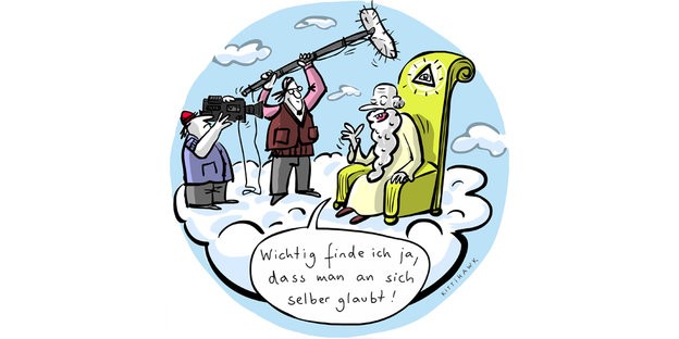 Karikatur von einem Fernsehteam, das einen Mann mit Bart im Sessel auf einer Wolke interviewt. Er sagt: „Wichtig finde ich ja, dass man an sich selbst glaubt.“