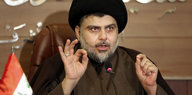 Ein Mann, Muktada al-Sadr