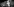 Ein Handy, in dem sich das Facebook-Logo spiegelt, liegt auf einer Tastatur, alles ist schwarz-weiß