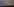 ein Windrad über einem Wald mit Regenbogen darüber