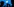 Ein Schattenriss von drei Menschen, die Smartphones in der Hand halten, vor einer Wand mit dem Twitter-Logo