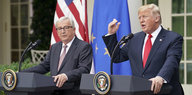 EU-Kommissionspräsident Juncker und US-Präsident Trump stehen an Pulten vor dem Weißen Haus, Trump redet und hat den linken Arm erhoben
