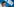 Ralf Becker, ein Mann mit kurzen, dunklen, zurückgegelten Haaren vor einer blauen Wand
