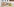 Plakatwand mit abgerissenen Plakaten