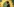Gesine Agena ist im Profil zu sehen, sie steht an einem Rednerpult vor dem Sonnenblumen-Logo der Grünen