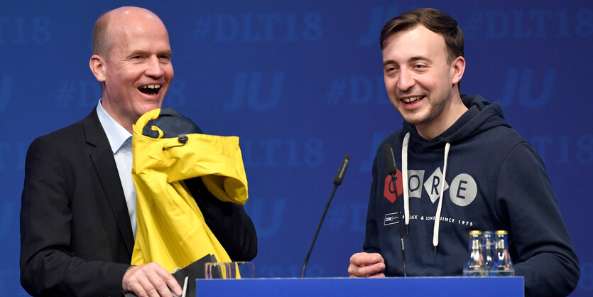 Beim Deutschlandtag der "Jungen Union" lachen Ralph Brinkhaus und Paul Ziemiak