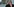 Theresa May schirmt die Augen ab