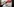 jemand malt mit roter Farbe über ein schwarz-weiß-Bild, das Beate Zschäpe zeigt
