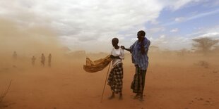 Flüchtlinge im Sandsturm