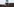 Eine Hand hält ein Smartphone und macht ein Foto vom Meer, das auch im Hintergrund zu sehen it