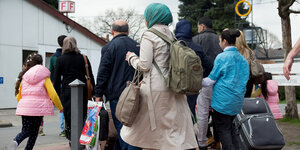 Flüchtlinge, Ankunft im Lager