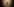 Ein Holzkreuz an einer Wand