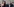 Amal Clooney und George Clooney, dahinter Fotografen