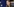 Greta Thunberg spricht an einem Podest, im Hintergrund eine EU-Flagge