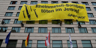 Greenpeace-Transparent an Hausfassade