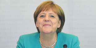 Angela Merkel lächelt