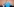 Merkel steht neben Olaf Scholz, der sitzt