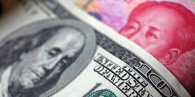 US-Dollar-Schein und chinesische Yuan-Note