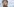 Katrin Lompscher schürzt die Lippen und macht unter hochgezogenen Augenbrauen ein ernstes Gesicht.