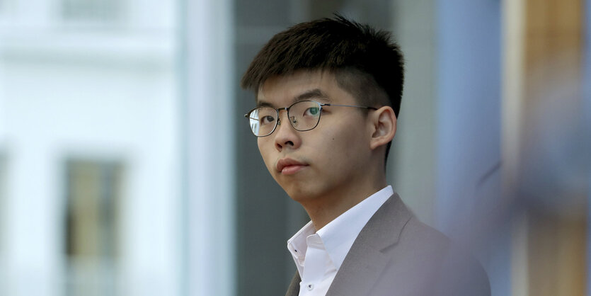 Der Aktivist Joshua Wong bei einer Pressekonferenz in Berlin.