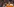 Der Philadelphia Flyers Jay Rosehill trägt ein orangnes Trikot und schreit vor Wut