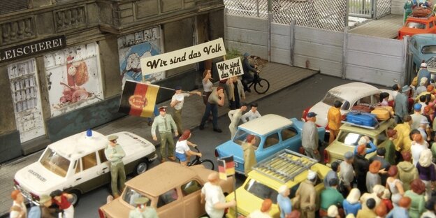 Ein Modell zeigt eine Szene an der Berliner Mauer