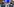 Zwei Männer in Polizeiuniform am Flughafen, von hinten fotografiert.