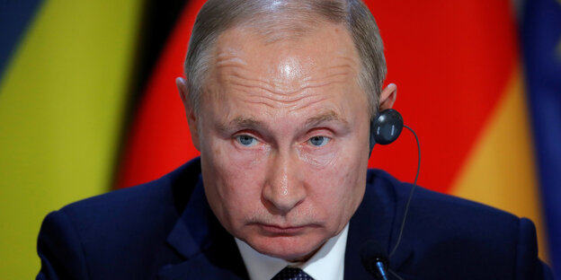 Putin mit Kopfhörer