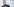 Jeremy Irons steht vor einer Wand