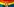Zwei ausgestreckte Mittelfinger vor einer Regenbogenflagge.