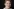 Bundesfamilienministerin Franziska Giffey vor dunklem Hintergrund