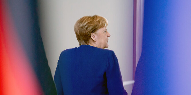 Rücken von Angela Merkel