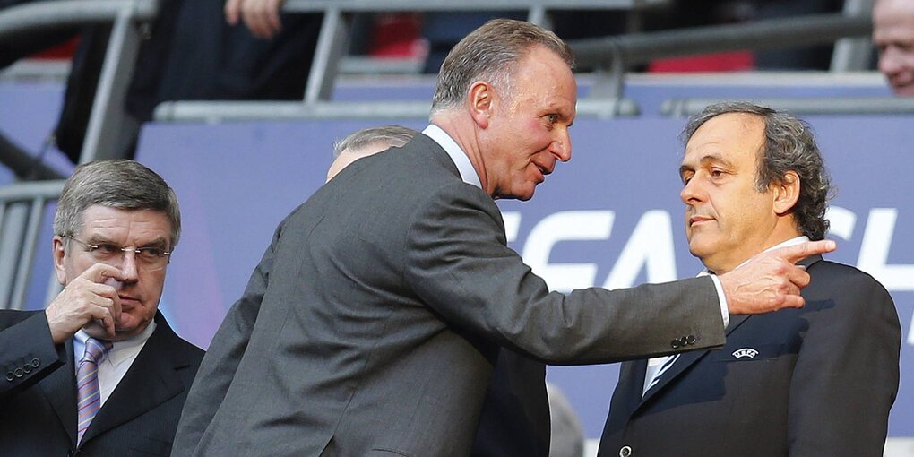 Karl-Heint Rummenigge und Michel Platini auf der Stadiontribüne