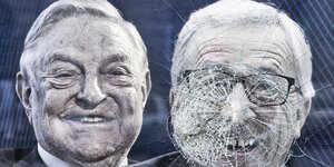 Ein zerstörtes Plakat mit den Gesichtern von Soros und Juncker.