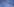 Eine Tribüne mit blauen Sitzen, alle leer