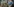 Intensivpädagogisches Projekt "Neustart" hängt am Eingang. Im Hintergrund Backsteinhäuser