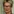Portrait einer Frau mit Brille und kurzen Haaren