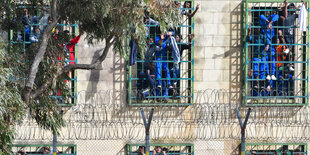 Migranten auf Malta protestieren.