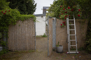 Der Eingang in einen Garten Der Eingang in einen Garten
