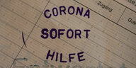 Ein gestempeltes Dokument mit der Aufschrift "Corona-Soforthilfe"